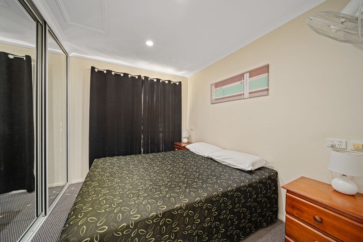Queen bedroom in the Executive Easy Access Queen apartment